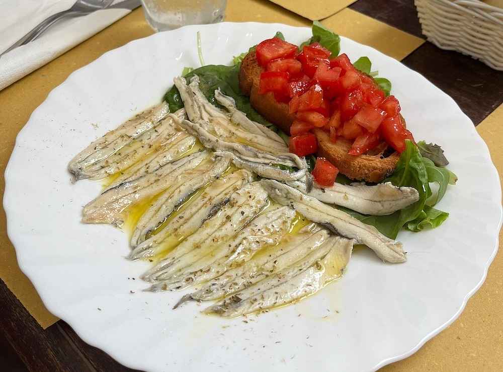 bruschetta e acciughe marinate